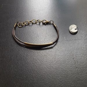 Brown and bronze braclet.